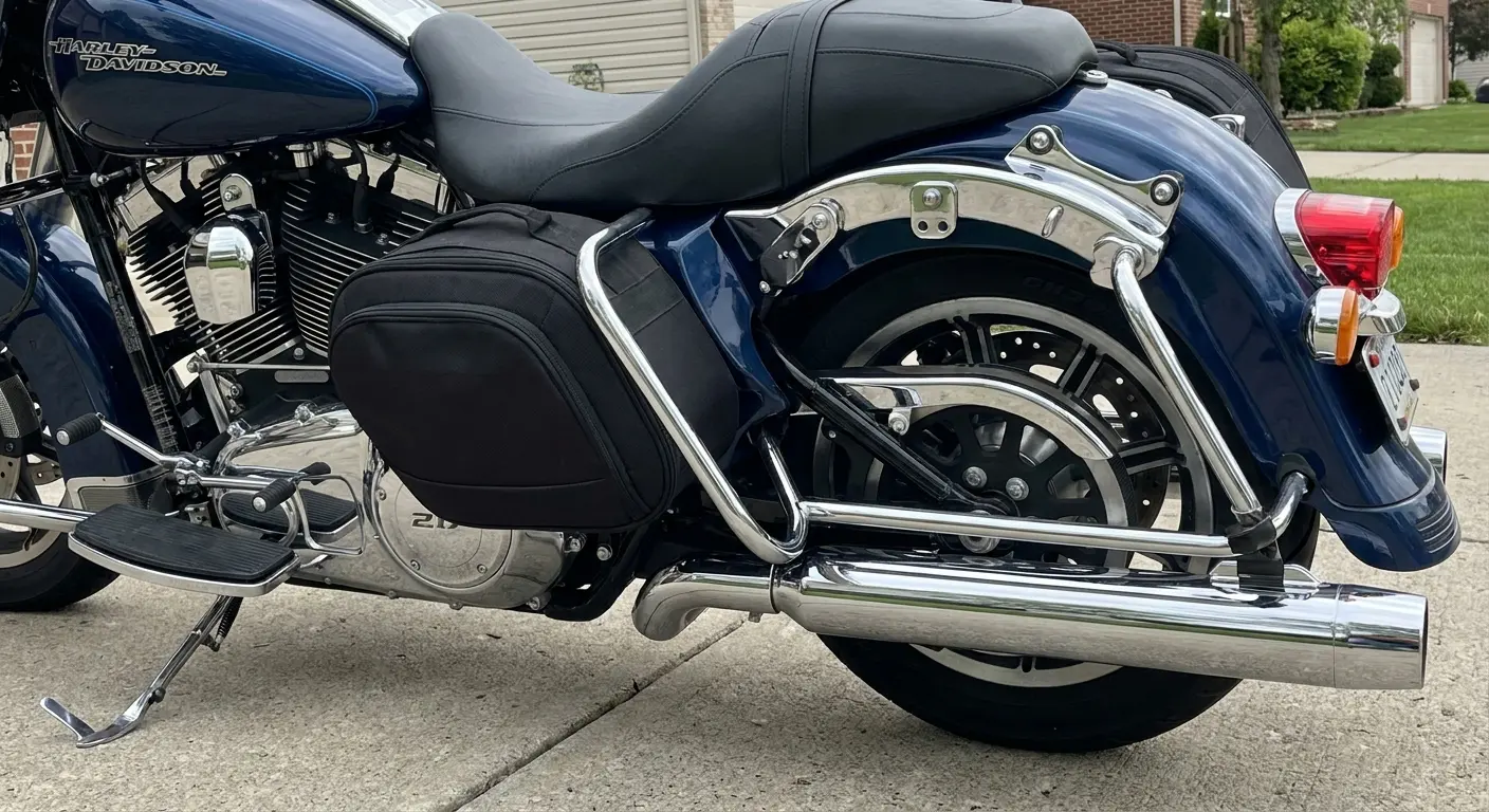 Saddlebag support brackets installed on motorcycle frame