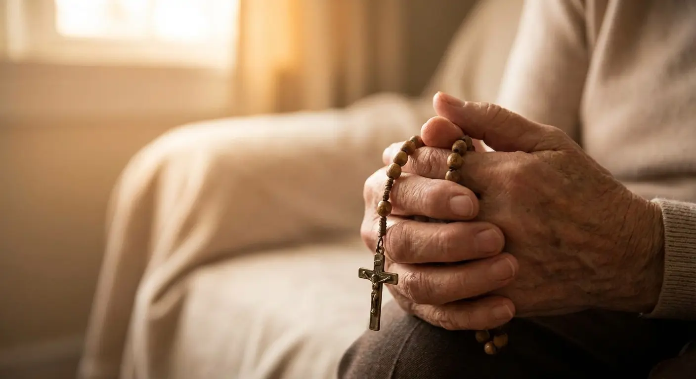 Woman looking out a window with an expression of strength and faith